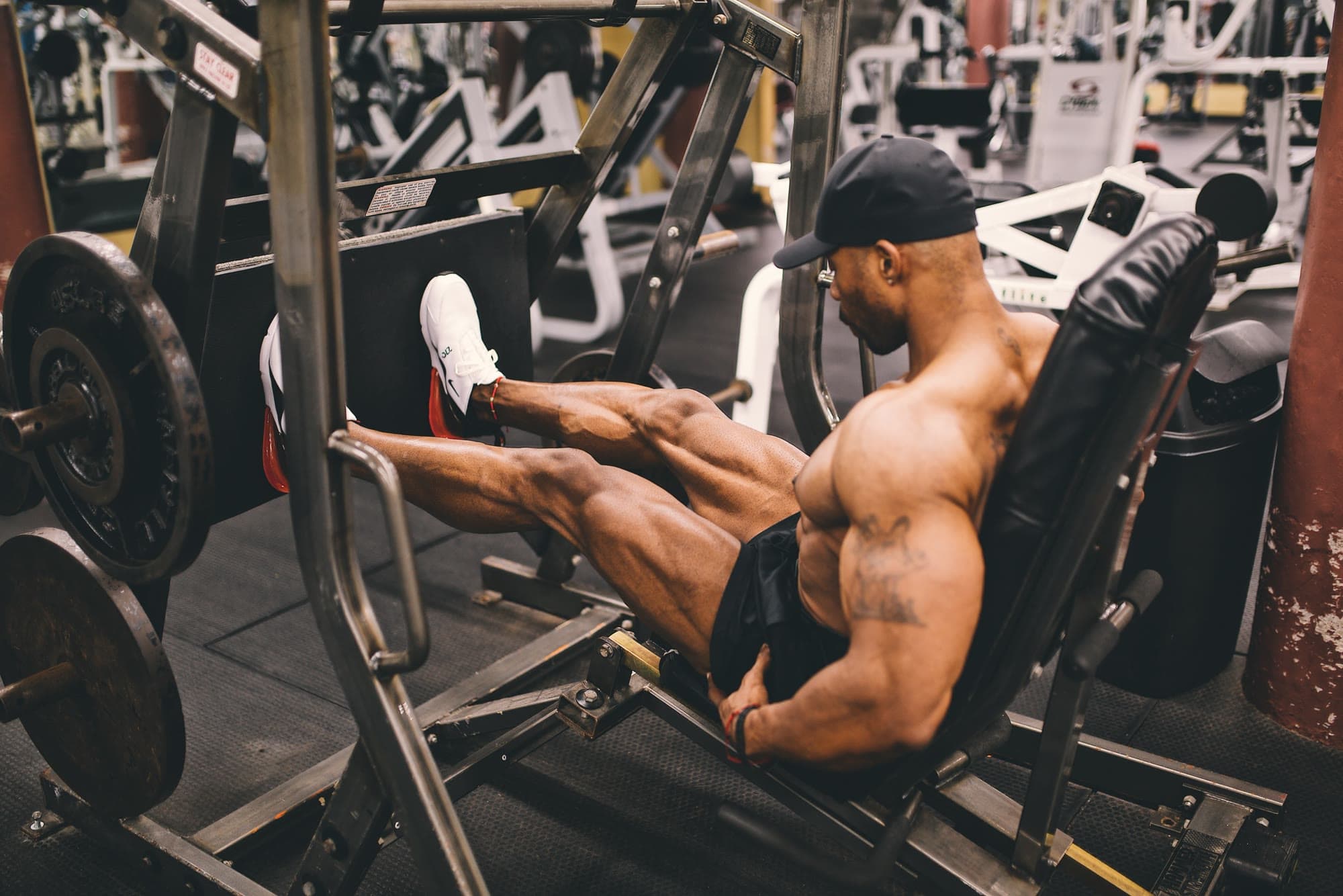 Daine Chang training on the leg press